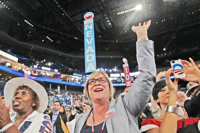 Nevada delegation Chairwoman Roberta Lange cheers and waves at Sen. Harry Reid as he takes the stage to deliver his speech to the Democratic National Convention in Charlotte, N.C., Tuesday night.